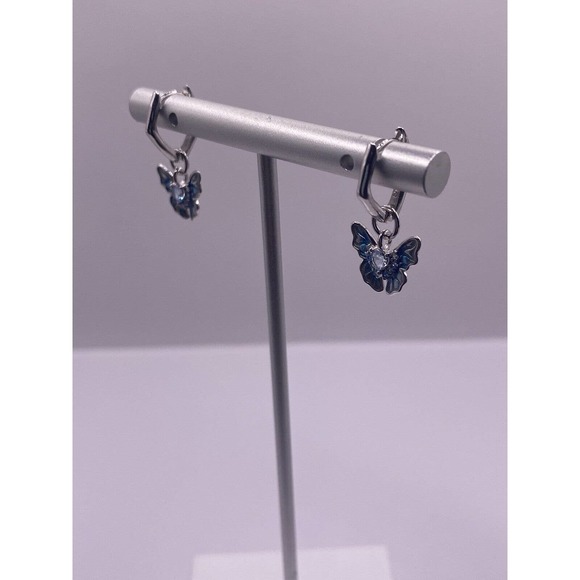 Gorgeous butterfly Dangle sterling silver earrings with a heart blue CZ - Picture 1 of 4